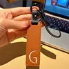 Brown letter card-g