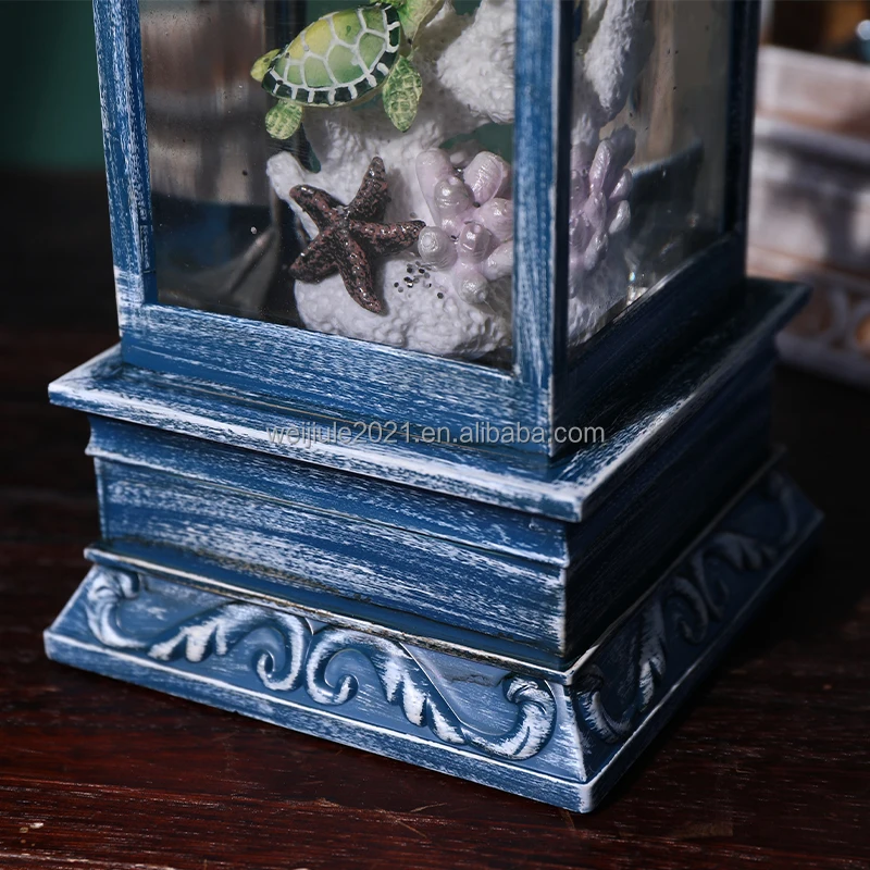 New resin lighthouse design and decorative wind lamp, unique rotating water-light snow globe