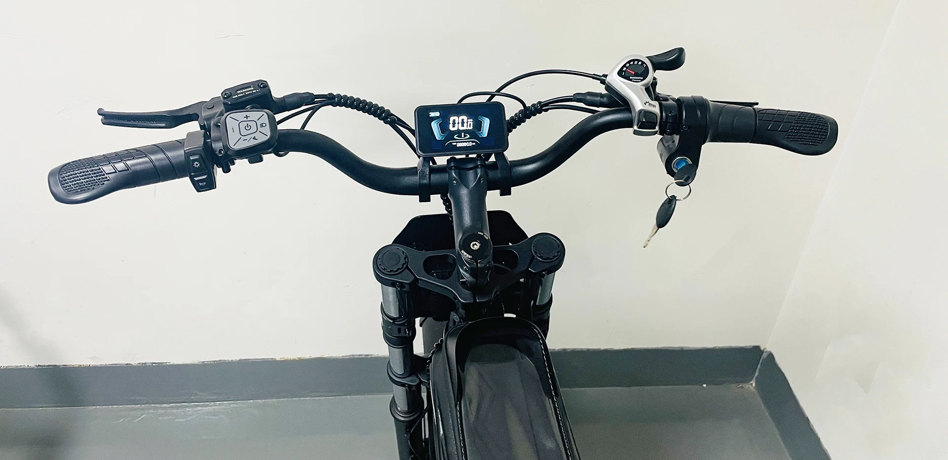 Bopzin Q20 full suspension fat tire electric bike in stealth black with motorcycle style frame