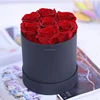 7 rose In scatola rotonda