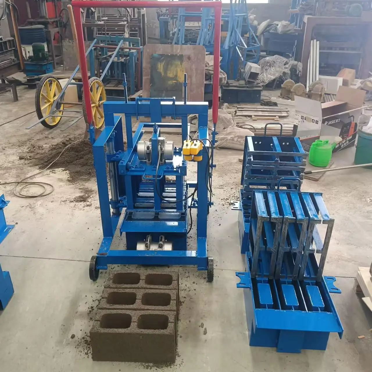 Egg Laying Mobile Manual Brick Machine Concrete Cement Brick Making Machine Small Hollow Block Making Machine for Sale in USA