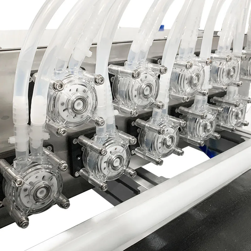 DOVOLL Full Automatic Desktop CNC Liquid Oil Filling Machine With Conveyor Beverage Milk Perfume Filling Machine Water Filler - Image 6