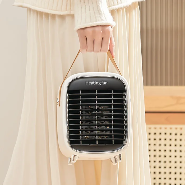 Новый продукт низкоэнергосберегающий малошумный безопасный Ptc электрический портативный Теплое Пространство вентиляторы обогреватели с ночным освещением для использования в