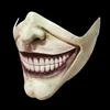 The lower half of the face is toothy, mask light beige