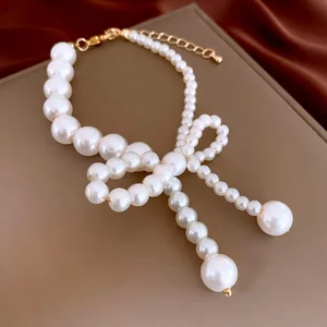Exquisite Pearl Bow Bracelet Elegant Handmade Jewelry Unique Design for Women's Party Daily Wear Adding Charm Elegance