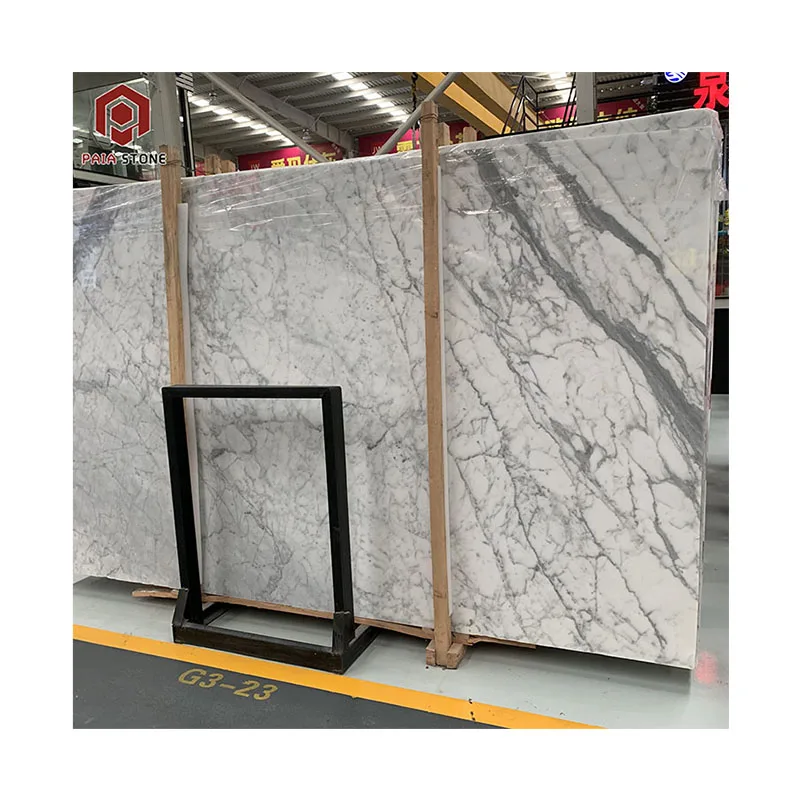 Marmur Statuario tal-Italja bil-biżer ta’ kulur bajda b’vejni griżi għall-dekorazzjoni interna u għall-istazzjonijiet tal-kċina