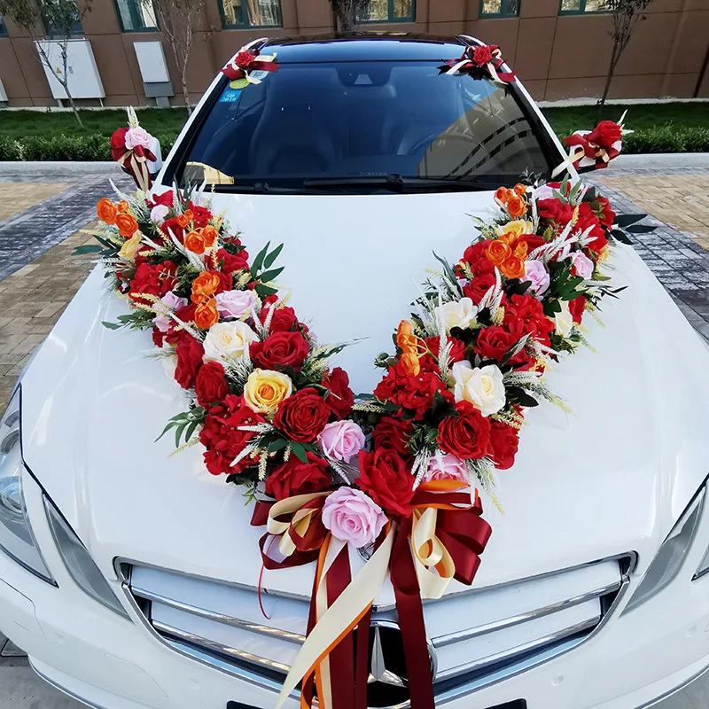 Addobbi floreali per macchina sposi | decorazioni auto per sposi