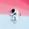 Astronauta piegato su nero-40*27 mm