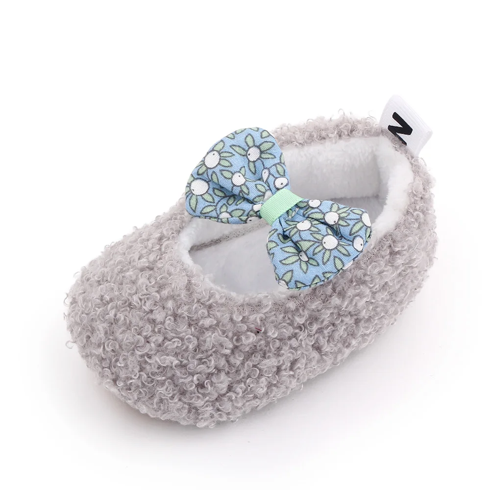 Autumn and Winter 0-1 Year Old Baby Solid Color Fluffy Cute Bow Warm Soft Soled Cotton Shoes manufacture