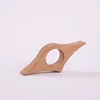 Beechwood book-holding finger clips - one side with a curved bottom