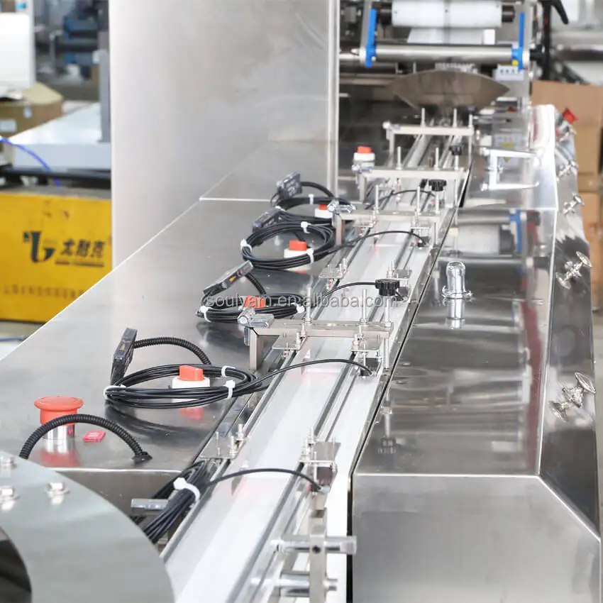 Automatic High Speed Flow Packaging Machine for Hard Candy Doughnut Biscuit Nutrition Cereal Nougat Chocolate Energy Protein Bar