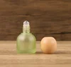 Tapa de madera verde de 10 ml, sin logo.