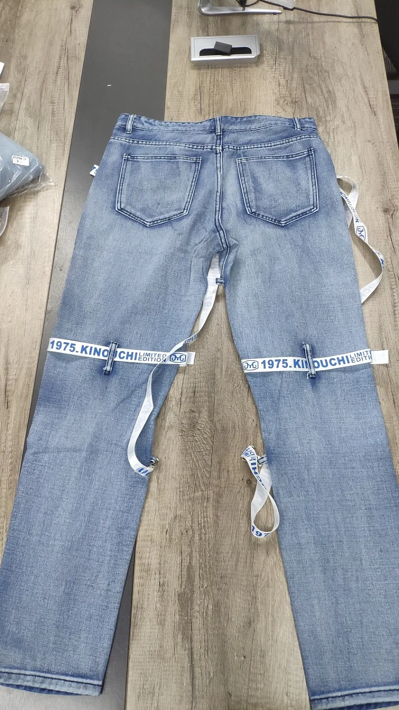 QC - 067 New design street fashion men designers jean with zipper and lace up ribbon ripped cotton pencil men's jeans