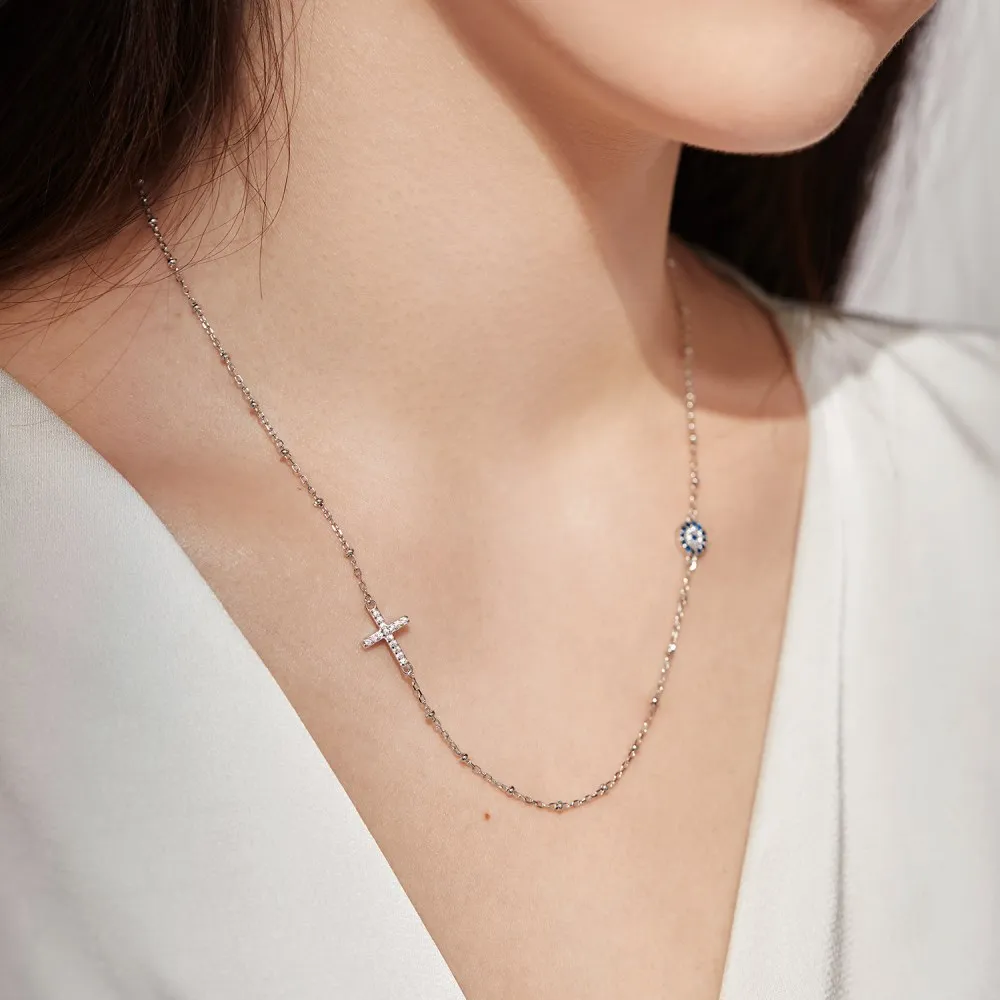 KAKODIY Water Drop Delivery Fine Jewelry Turkish Blue Magic Eye Pendant Necklace Paved Cubic Zirconia Cross Necklace for Women detail 1