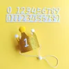 Yellow glitter hat [1 number sticker]