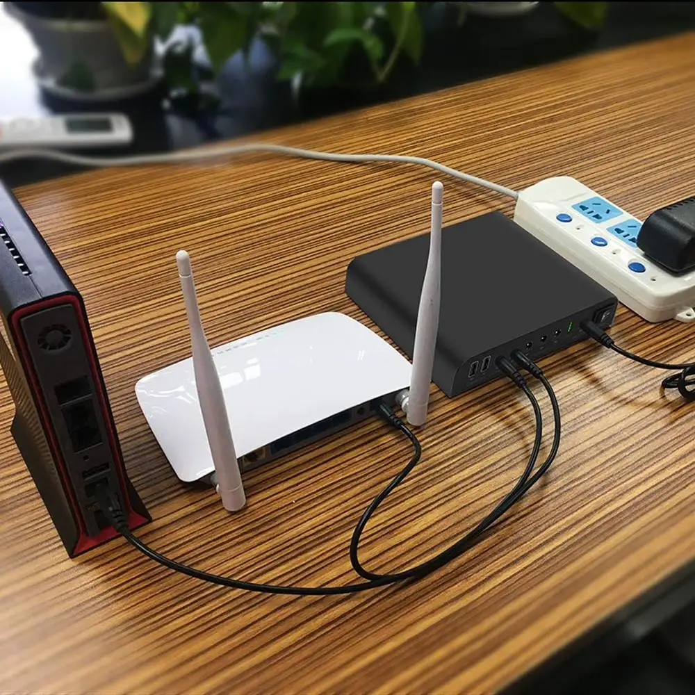 18650 Li-Ion Mini Ups 7 Output Port DC USB 5v 9v 12v Solar Charging Mini UPS for Wifi Router 12v Ups Universal Power Supply