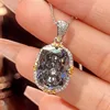 Black and gray pendant with box chain