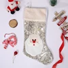Papá Noel dorado y blanco