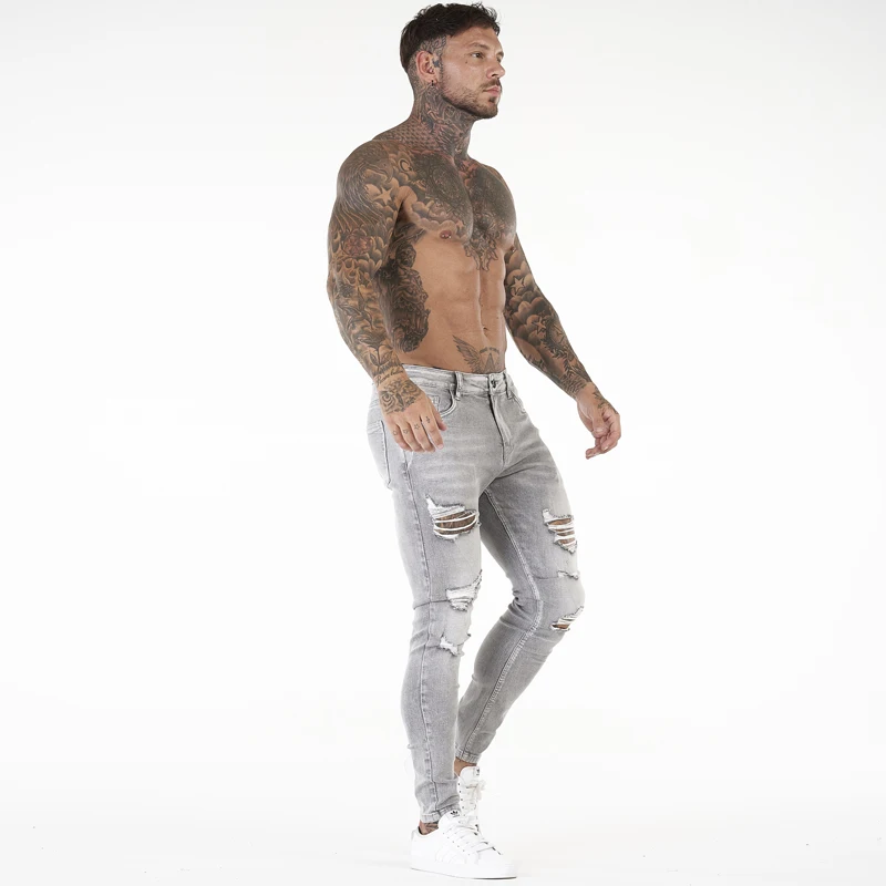 Etichette private personalizzate, alla moda, taglie forti, jeans strappati attillati da uomo, pantaloni in denim consumato_voghion.com