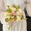 White notepad-rose chamomile bouquet