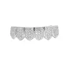 Argent en dessous des dents