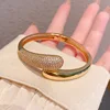 Bracelet ouvert en forme de serpent en or