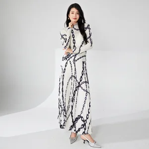 Women's Pleated Fashion Set Loose and Casual Style Stretch Printed Long-Sleeved Top and A-Line Skirt Two-Piece Set