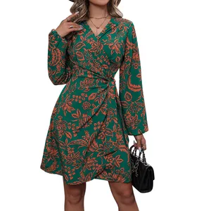 For the autumn of 2025, a casual dress for women with printed vacation wraps and long-sleeved skirts
