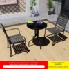 2 chaises+table ronde en verre noir 60cm
