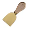 Spatule à fromage dorée