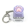 Patte de chat en silicone violet à un bouton