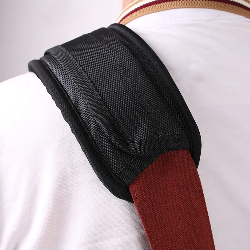 Comfortable/removable shoulder pad for guitar straps