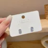 9 pendientes medianos de circonita de 4 mm