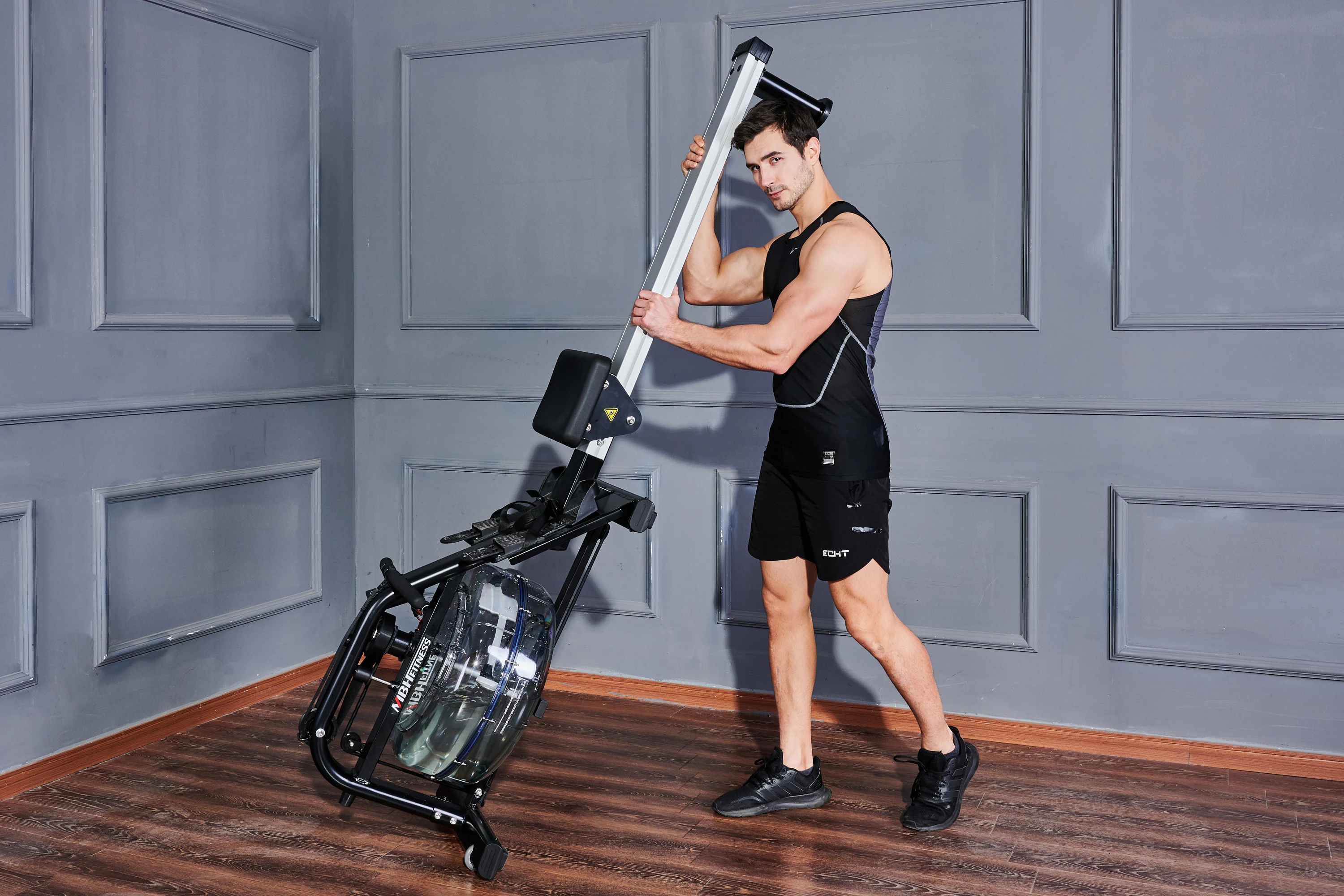 Гребной тренажер для домашнего тренажерного зала