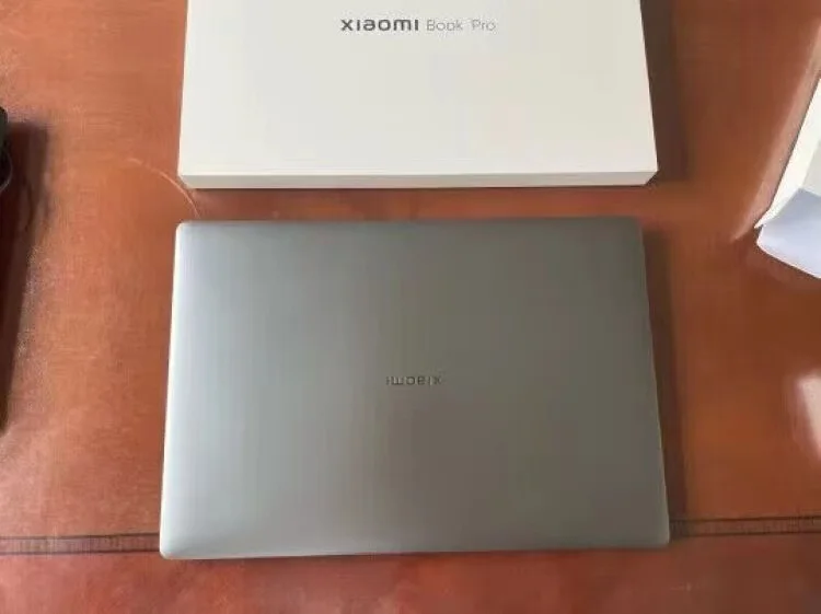 Xiaomi book pro 16 i7 1260p. Распаковка Xiaomi book 16 Pro OLED.
