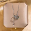 Doppio anello con nappa