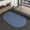 New generation of diatomaceous earth bathroom mats - natural oval blue