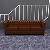 Brown + three-seater sofa
