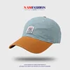 Gorra de béisbol con diseño patchwork y bloques de color - Azul claro