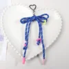 Love buckle sapphire blue pendant