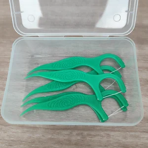 Daily Care Unique Design Anti-slip PP Handle Green Floss Pick with Box Package UHMWPE Floss with Pick for Adult