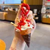 Artificial ice cream cone with fruit-strawberry crunchy fries