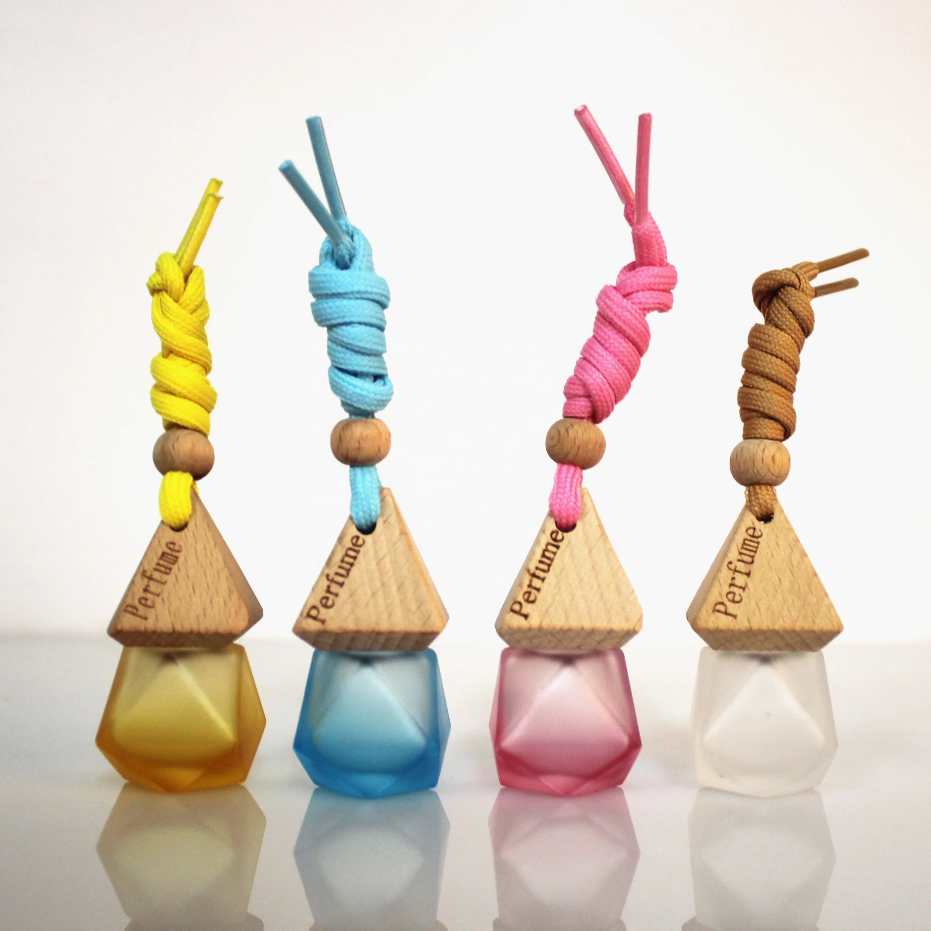 Wholesale 8ML Multi-Color Matte Car Aroma Bottle With Wooden Cover and Lanyard Wonderful Pyramid Shape Car Perfume Diffuser
