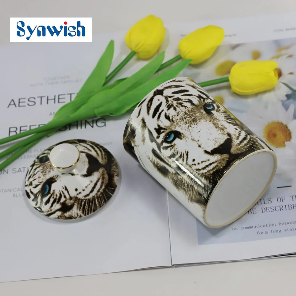 Synwish Aroma Reed Diffuser Bottle Stone Scented Candle Set Ceramic Candle Vessels Tiger Face Jar Holders With Lids supplier