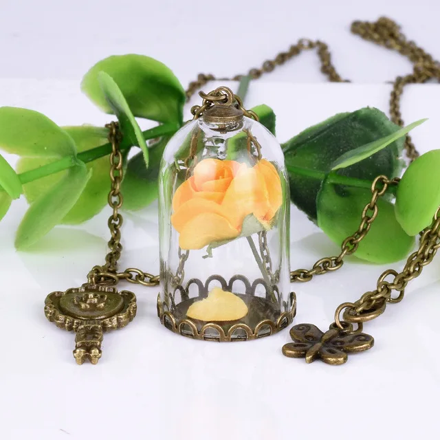 beauty and the beast rose in glass necklace