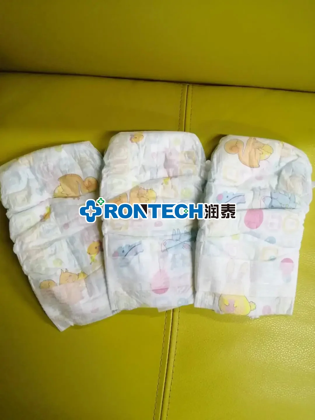 Fully Automatic High Speed Full Servo  Waistband Baby Diaper Production Line Highly Absorbent Lovely Baby Diaper Making Machine