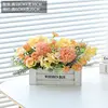 White wooden fence with roses and oranges