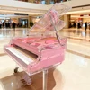 Piano en acrylique rose