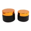 Black jar with gold lid