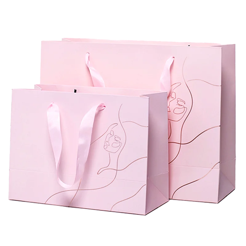 Medium (24cm x 31cm x 11cm) Light Pink Twisted Handle Paper Bags